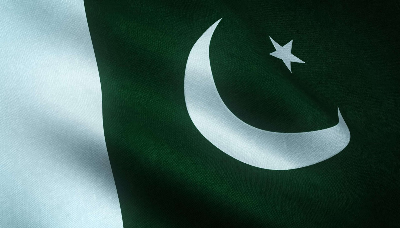 A closeup shot of the waving flag of Pakistan with interesting textures